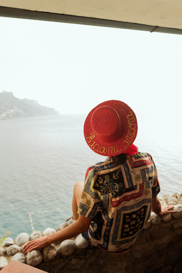 BACIAMI ANCORA - red straw hat with paillette mantra on the brim